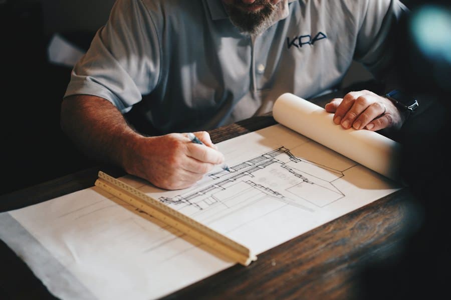 A builder reviewing construction plans